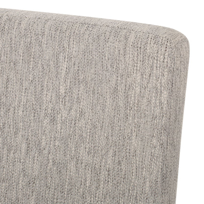 Contemporary Dining Chair With Upholstered Seating And Tapered Legs