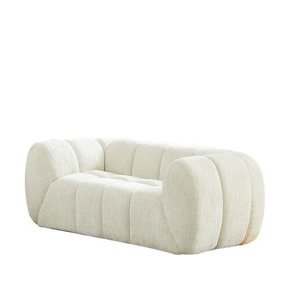 Quilted Cloud Sofa With Rounded Armrests And Piano Key Backrest Design